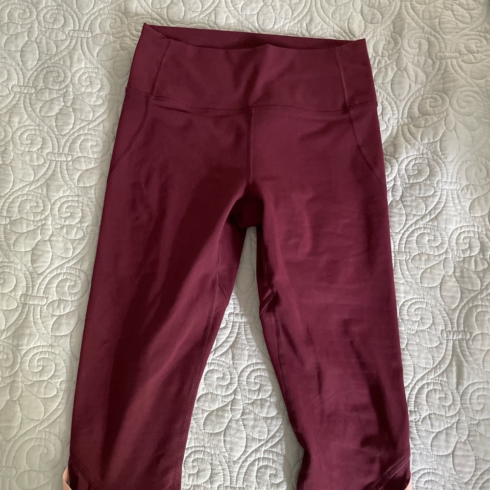 Purple/magenta Fabletics leggings